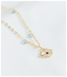 Collar en Acero Inoxidable con Planeta y Estrella – Elegancia Cósmica