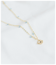 Collar en Acero Inoxidable con Planeta y Estrella – Elegancia Cósmica